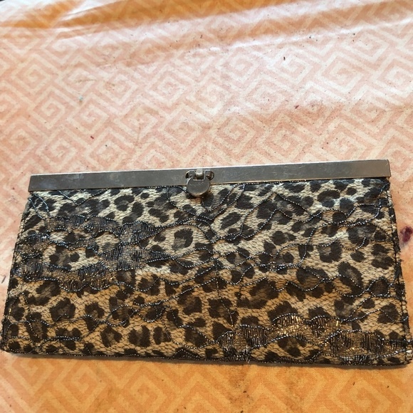 Handbags - Animal print wallet, snap closure, new or like new. Animal prints are back in!